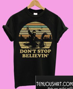 Bigfoot riding on Nessie Loch Ness monster Don't stop believin T-Shirt